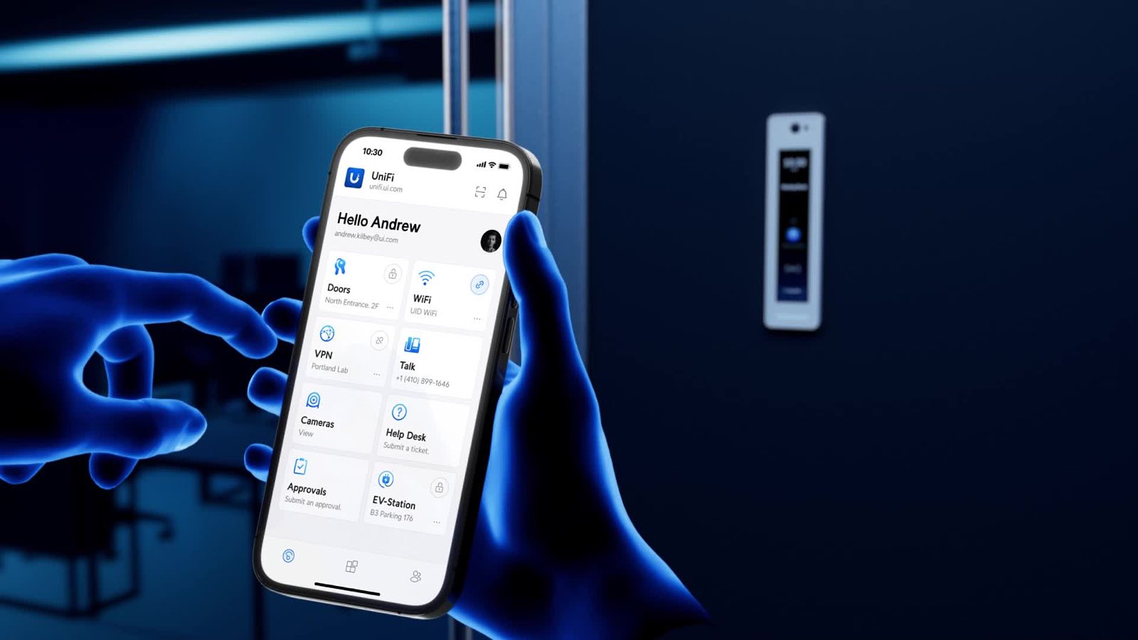 Access control app on a phone beside a door-mounted reader